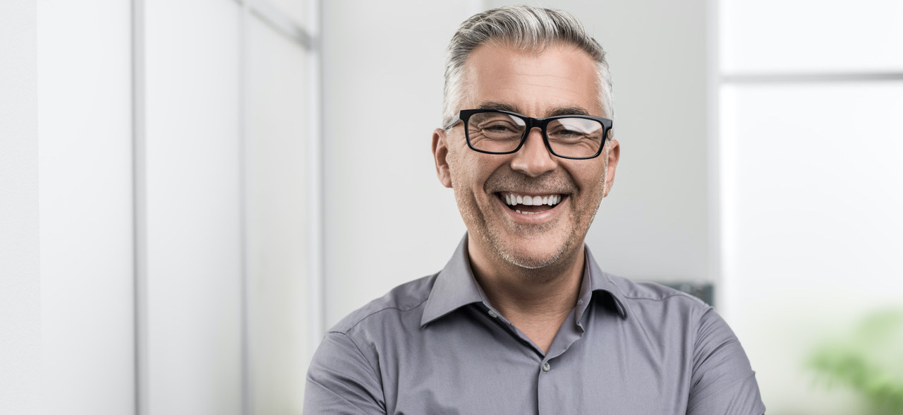 List Commercial Property Somerville Confident businessman posing in the office